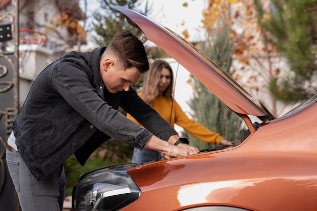 person considering different ways to sell a damaged car