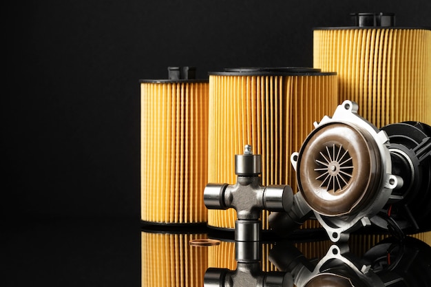 close up of oil filter and fresh motor oil