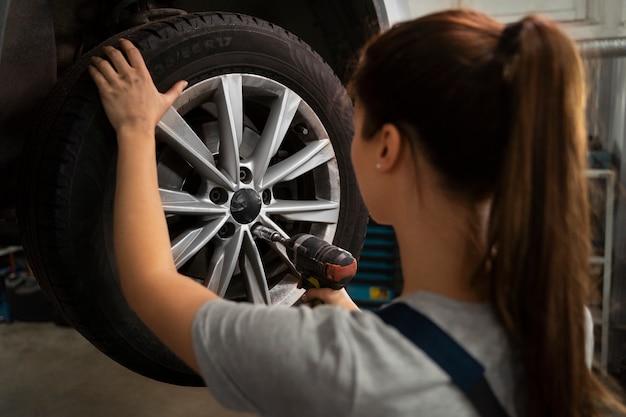 happy driver behind the wheel after wheel alignment service